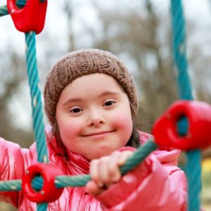 Portrait of beautiful girl on the playground